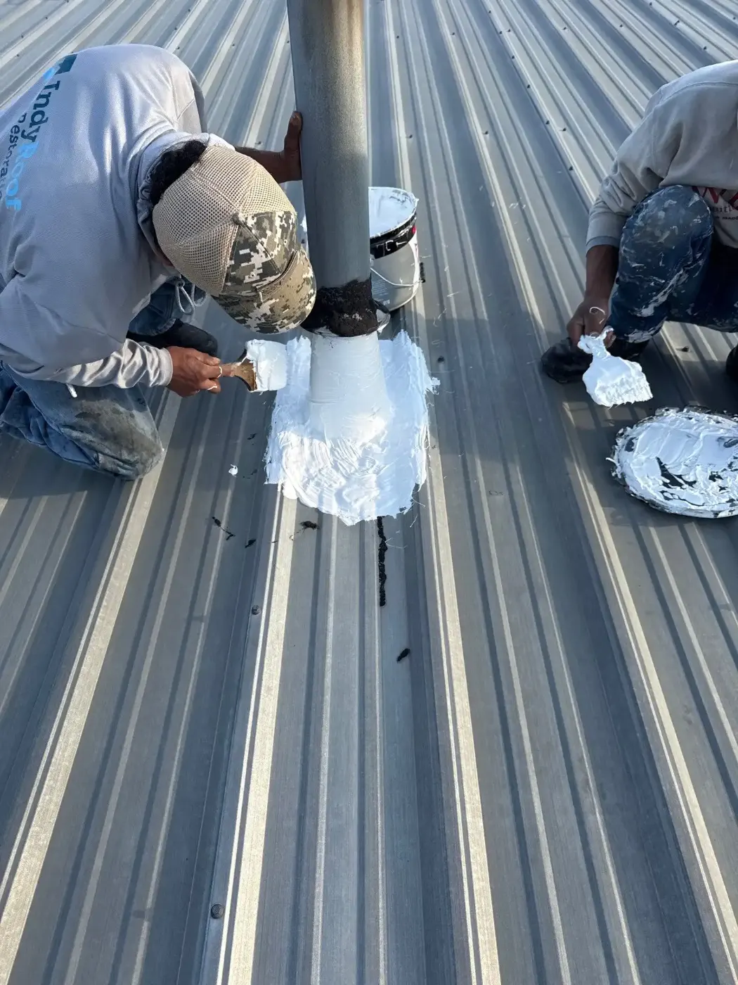 Tarping and dry-in on a Russiaville commercial roof