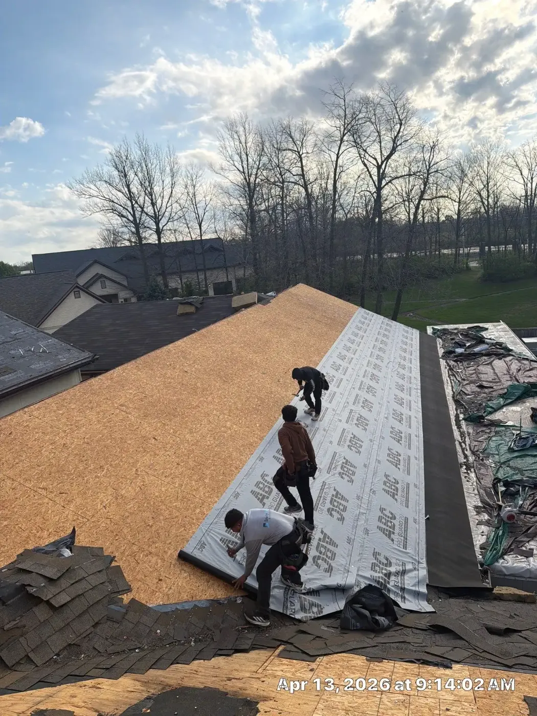 Tarping and dry-in on a Russiaville commercial roof